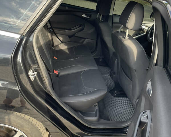 Черный Форд Фокус, объемом двигателя 1.5 л и пробегом 220 тыс. км за 8900 $, фото 12 на Automoto.ua