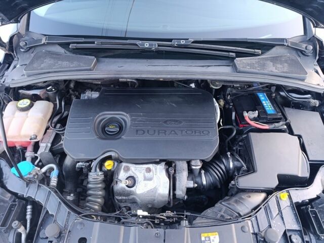 Черный Форд Фокус, объемом двигателя 1.5 л и пробегом 236 тыс. км за 8300 $, фото 21 на Automoto.ua