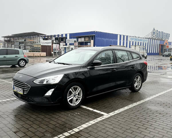 Черный Форд Фокус, объемом двигателя 1.5 л и пробегом 104 тыс. км за 11950 $, фото 1 на Automoto.ua