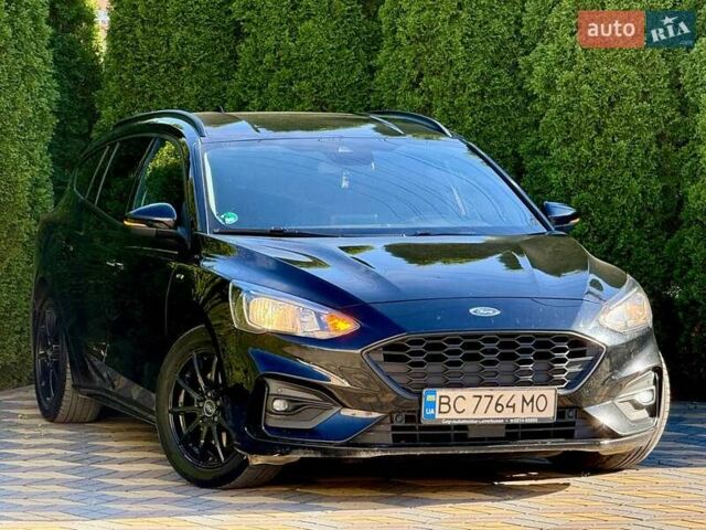 Черный Форд Фокус, объемом двигателя 2 л и пробегом 243 тыс. км за 13799 $, фото 1 на Automoto.ua