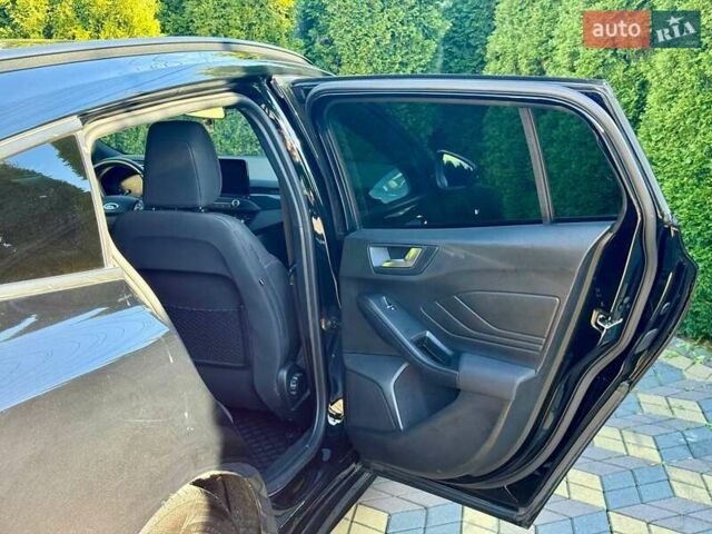 Черный Форд Фокус, объемом двигателя 2 л и пробегом 243 тыс. км за 13799 $, фото 17 на Automoto.ua