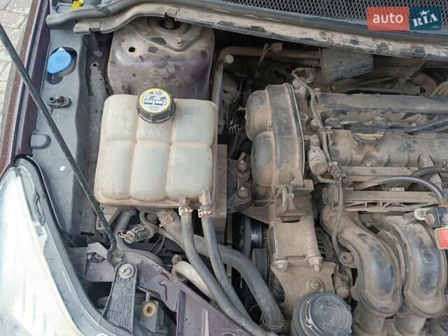 Фиолетовый Форд Фокус, объемом двигателя 1.6 л и пробегом 280 тыс. км за 5400 $, фото 25 на Automoto.ua