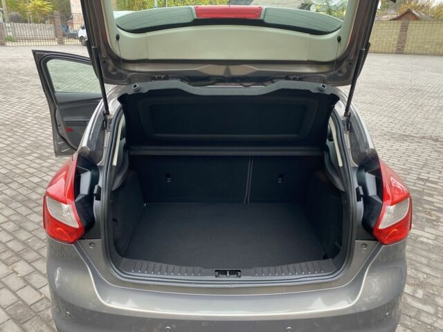 Коричневий Форд Фокус, об'ємом двигуна 1 л та пробігом 115 тис. км за 7400 $, фото 11 на Automoto.ua