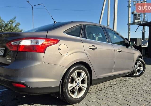 Форд Фокус 2013 в Львове на Automoto.ua Коричневый Форд Фокус, объемом двигателя 1 л и пробегом 106 тыс. км за 8400 $, фото 3 на Automoto.ua