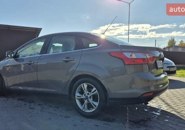 Форд Фокус 2013 в Львове на Automoto.ua Коричневый Форд Фокус, объемом двигателя 1 л и пробегом 106 тыс. км за 8400 $, фото 5 на Automoto.ua