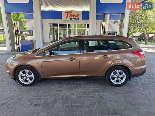 Коричневый Форд Фокус, объемом двигателя 1 л и пробегом 247 тыс. км за 6900 $, фото 13 на Automoto.ua