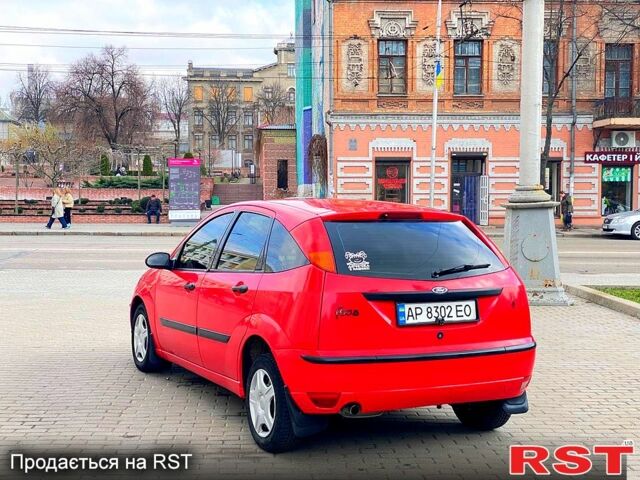 Красный Форд Фокус, объемом двигателя 1.4 л и пробегом 250 тыс. км за 2550 $, фото 7 на Automoto.ua