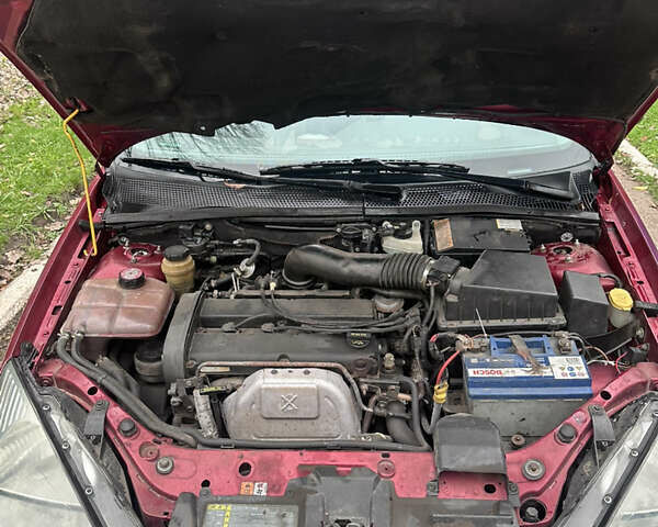 Красный Форд Фокус, объемом двигателя 2 л и пробегом 193 тыс. км за 2500 $, фото 7 на Automoto.ua