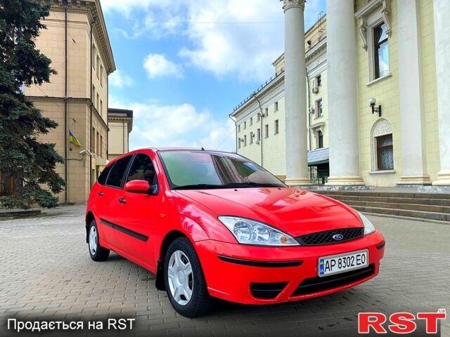Красный Форд Фокус, объемом двигателя 1.4 л и пробегом 250 тыс. км за 2550 $, фото 3 на Automoto.ua