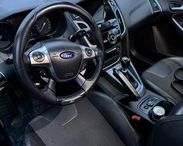 Червоний Форд Фокус, об'ємом двигуна 1.6 л та пробігом 270 тис. км за 10600 $, фото 6 на Automoto.ua