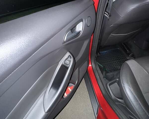Червоний Форд Фокус, об'ємом двигуна 1.6 л та пробігом 270 тис. км за 10600 $, фото 17 на Automoto.ua