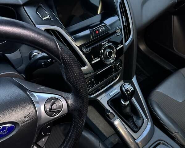 Червоний Форд Фокус, об'ємом двигуна 1.6 л та пробігом 270 тис. км за 10600 $, фото 7 на Automoto.ua