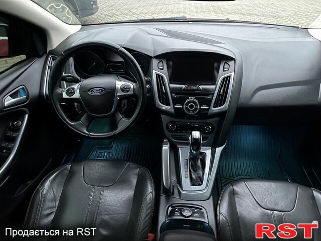 Красный Форд Фокус, объемом двигателя 2 л и пробегом 135 тыс. км за 8100 $, фото 11 на Automoto.ua