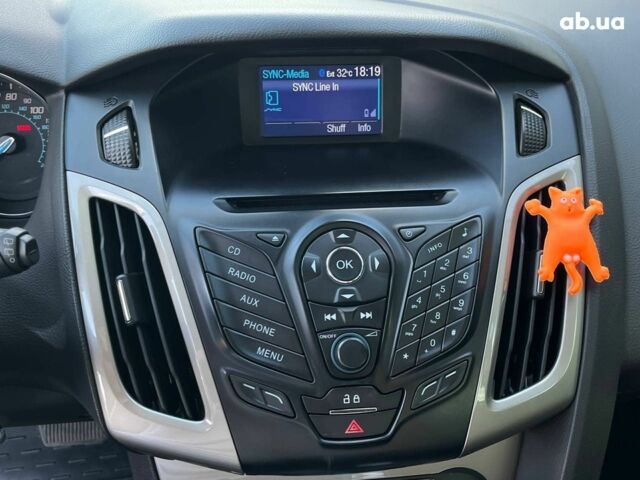 Красный Форд Фокус, объемом двигателя 2 л и пробегом 163 тыс. км за 8590 $, фото 17 на Automoto.ua