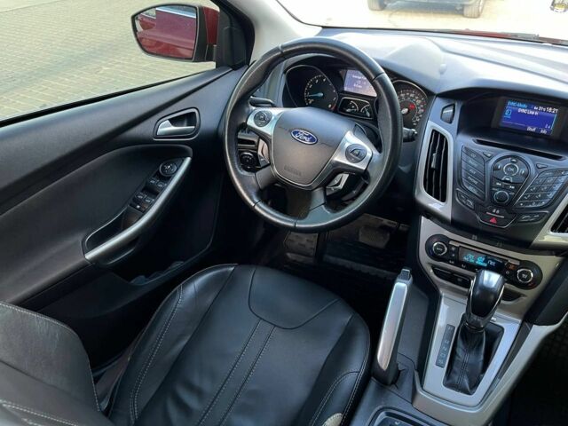 Красный Форд Фокус, объемом двигателя 2 л и пробегом 163 тыс. км за 8590 $, фото 4 на Automoto.ua