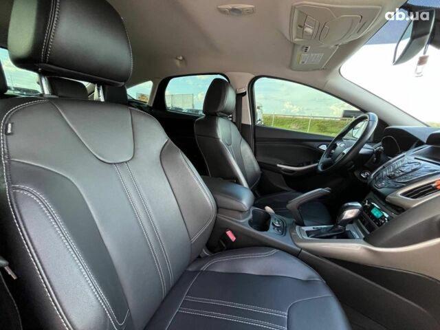 Красный Форд Фокус, объемом двигателя 2 л и пробегом 163 тыс. км за 8590 $, фото 10 на Automoto.ua