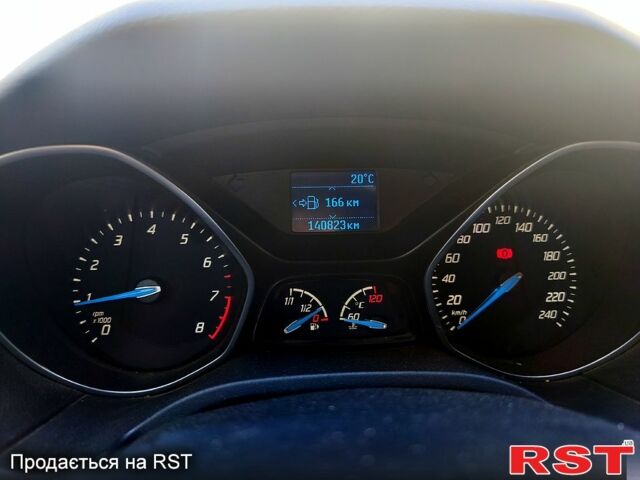 Красный Форд Фокус, объемом двигателя 1 л и пробегом 140 тыс. км за 7000 $, фото 3 на Automoto.ua