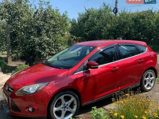 Красный Форд Фокус, объемом двигателя 2 л и пробегом 135 тыс. км за 8100 $, фото 3 на Automoto.ua