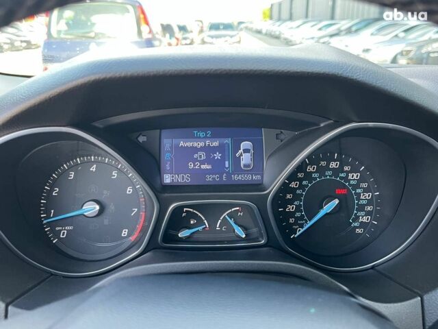 Красный Форд Фокус, объемом двигателя 2 л и пробегом 163 тыс. км за 8590 $, фото 24 на Automoto.ua