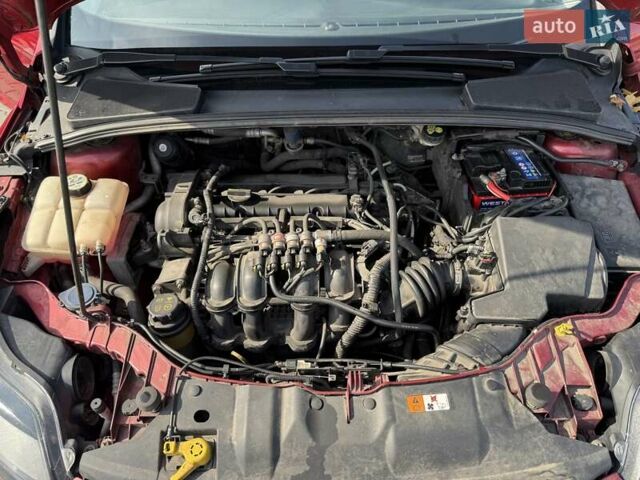 Красный Форд Фокус, объемом двигателя 1.6 л и пробегом 149 тыс. км за 6800 $, фото 9 на Automoto.ua