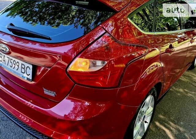 Червоний Форд Фокус, об'ємом двигуна 1 л та пробігом 78 тис. км за 8600 $, фото 42 на Automoto.ua