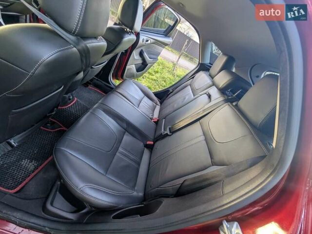Червоний Форд Фокус, об'ємом двигуна 2 л та пробігом 120 тис. км за 7999 $, фото 15 на Automoto.ua