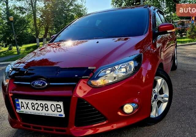 Форд Фокус 2013 в Харькове на Automoto.ua Красный Форд Фокус, объемом двигателя 1 л и пробегом 85 тыс. км за 8470 $, фото 8 на Automoto.ua