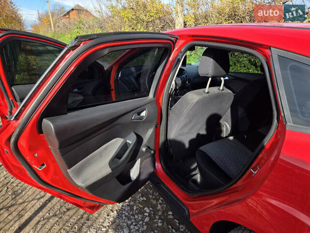 Форд Фокус 2013 в Хмельницком на Automoto.ua Красный Форд Фокус, объемом двигателя 1 л и пробегом 143 тыс. км за 7300 $, фото 13 на Automoto.ua