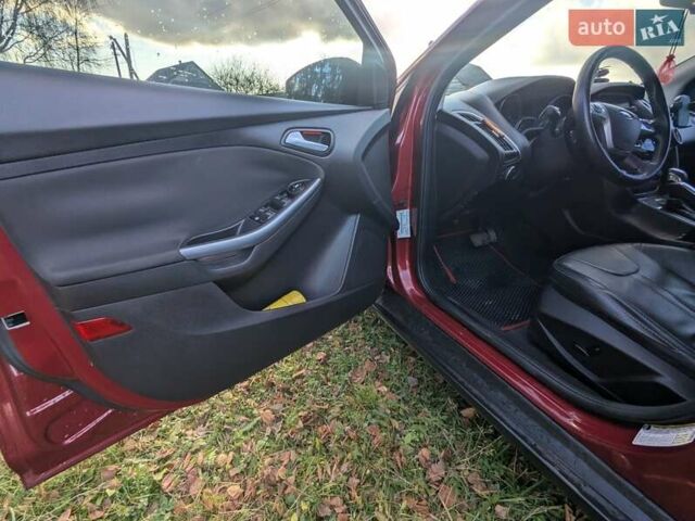 Червоний Форд Фокус, об'ємом двигуна 2 л та пробігом 120 тис. км за 7999 $, фото 18 на Automoto.ua