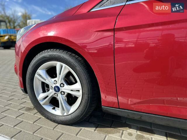 Червоний Форд Фокус, об'ємом двигуна 1 л та пробігом 143 тис. км за 7400 $, фото 13 на Automoto.ua