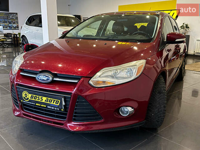 Червоний Форд Фокус, об'ємом двигуна 2 л та пробігом 171 тис. км за 8599 $, фото 2 на Automoto.ua