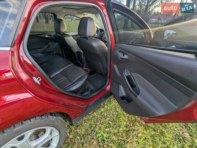 Червоний Форд Фокус, об'ємом двигуна 2 л та пробігом 120 тис. км за 7999 $, фото 11 на Automoto.ua