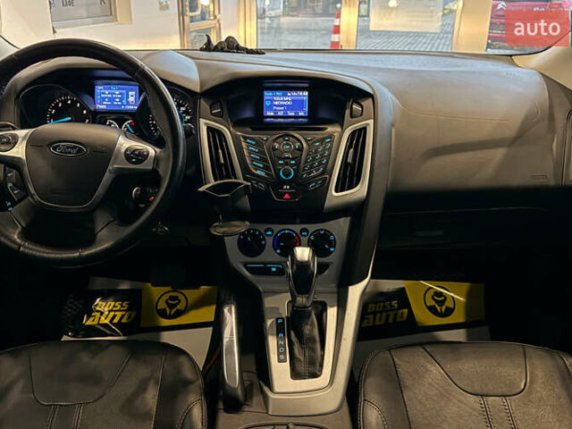 Червоний Форд Фокус, об'ємом двигуна 2 л та пробігом 171 тис. км за 8599 $, фото 9 на Automoto.ua