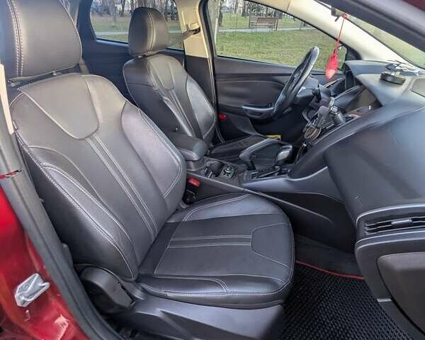 Червоний Форд Фокус, об'ємом двигуна 2 л та пробігом 120 тис. км за 7999 $, фото 8 на Automoto.ua