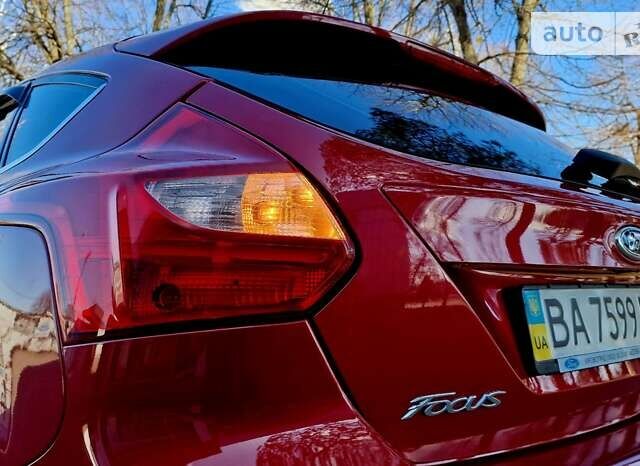 Червоний Форд Фокус, об'ємом двигуна 1 л та пробігом 78 тис. км за 8970 $, фото 26 на Automoto.ua