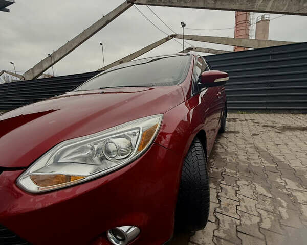 Красный Форд Фокус, объемом двигателя 2 л и пробегом 115 тыс. км за 8600 $, фото 1 на Automoto.ua