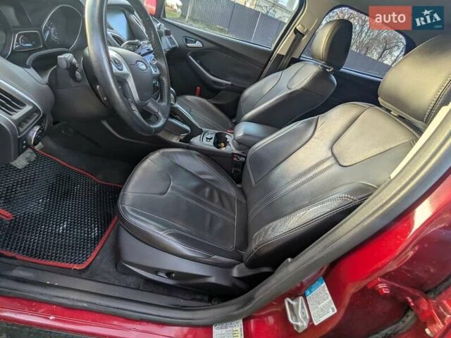 Червоний Форд Фокус, об'ємом двигуна 2 л та пробігом 120 тис. км за 7999 $, фото 17 на Automoto.ua