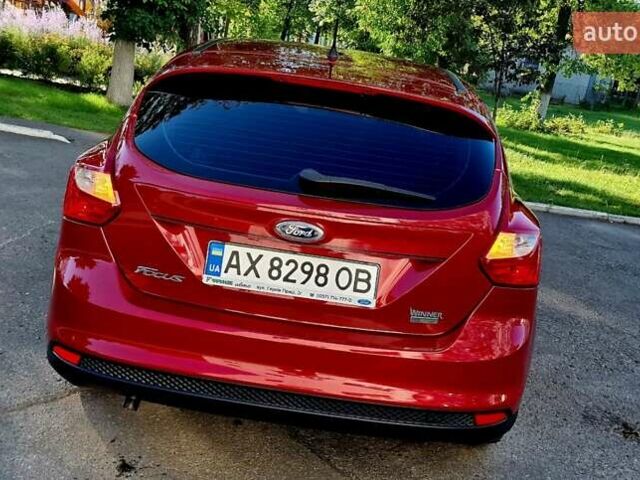 Форд Фокус 2013 в Харькове на Automoto.ua Красный Форд Фокус, объемом двигателя 1 л и пробегом 85 тыс. км за 8470 $, фото 24 на Automoto.ua