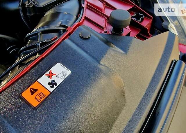 Красный Форд Фокус, объемом двигателя 1 л и пробегом 78 тыс. км за 8970 $, фото 58 на Automoto.ua