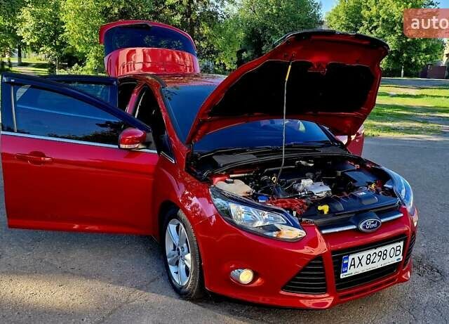 Форд Фокус 2013 в Харькове на Automoto.ua Красный Форд Фокус, объемом двигателя 1 л и пробегом 85 тыс. км за 8470 $, фото 48 на Automoto.ua