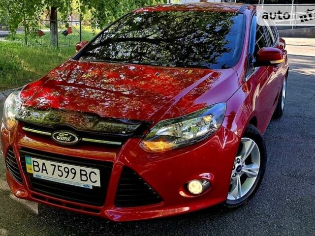 Червоний Форд Фокус, об'ємом двигуна 1 л та пробігом 78 тис. км за 8970 $, фото 11 на Automoto.ua