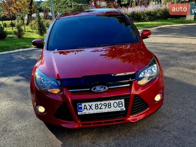 Форд Фокус 2013 в Харькове на Automoto.ua Красный Форд Фокус, объемом двигателя 1 л и пробегом 85 тыс. км за 8470 $, фото 13 на Automoto.ua