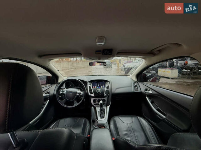 Красный Форд Фокус, объемом двигателя 2 л и пробегом 115 тыс. км за 8600 $, фото 6 на Automoto.ua