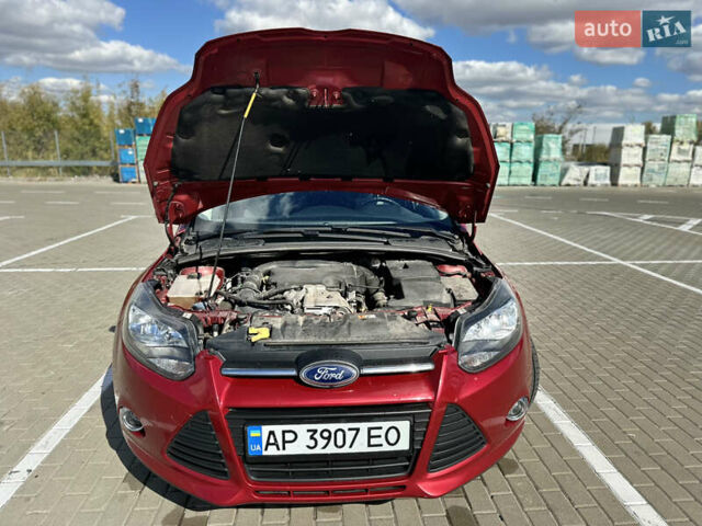 Червоний Форд Фокус, об'ємом двигуна 1 л та пробігом 143 тис. км за 7400 $, фото 9 на Automoto.ua