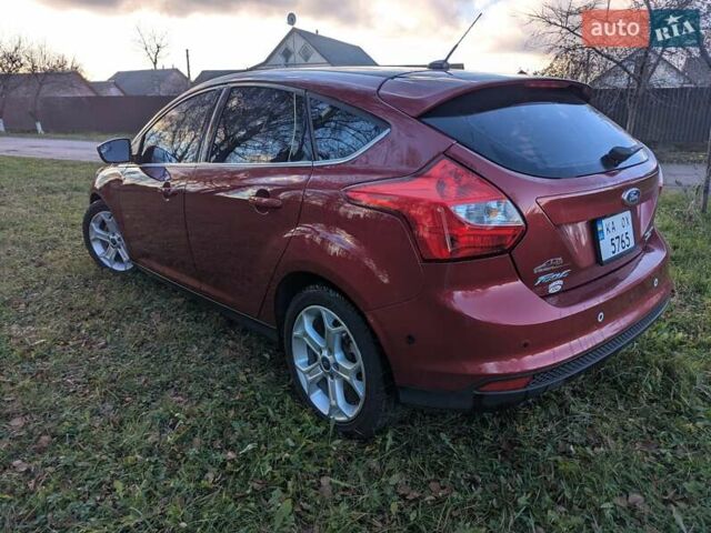 Червоний Форд Фокус, об'ємом двигуна 2 л та пробігом 120 тис. км за 7999 $, фото 4 на Automoto.ua