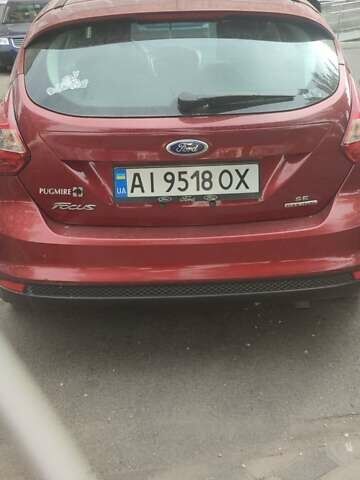 Червоний Форд Фокус, об'ємом двигуна 2 л та пробігом 215 тис. км за 7000 $, фото 1 на Automoto.ua