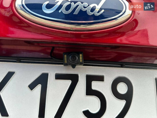 Червоний Форд Фокус, об'ємом двигуна 2 л та пробігом 144 тис. км за 8800 $, фото 20 на Automoto.ua