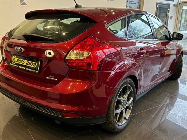 Червоний Форд Фокус, об'ємом двигуна 2 л та пробігом 171 тис. км за 8599 $, фото 6 на Automoto.ua