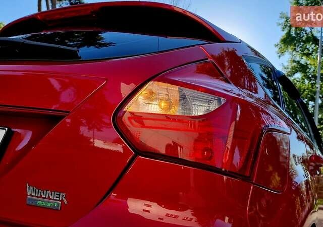 Форд Фокус 2013 в Харькове на Automoto.ua Красный Форд Фокус, объемом двигателя 1 л и пробегом 85 тыс. км за 8470 $, фото 43 на Automoto.ua