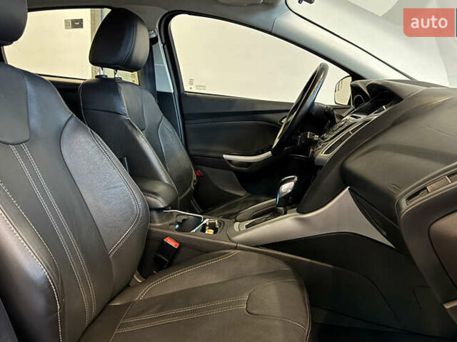 Червоний Форд Фокус, об'ємом двигуна 2 л та пробігом 171 тис. км за 8599 $, фото 20 на Automoto.ua